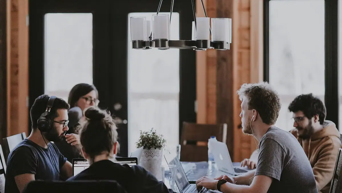 A consulting team working together around a table