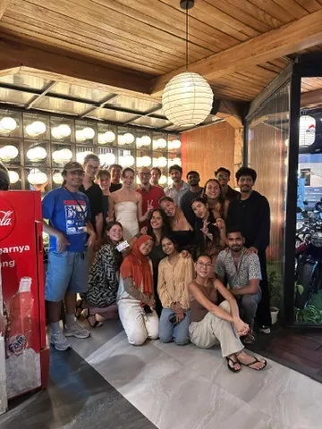 An Island Internship intake of around twenty students together after a group dinner in Canggu